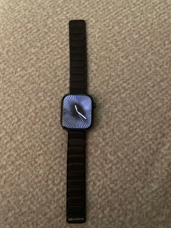 Apple Watch Series 10 GPS + Cellular, 46 mm Arduvaz Titanyum Kasa ve Siyah Spor Kordon – S/M